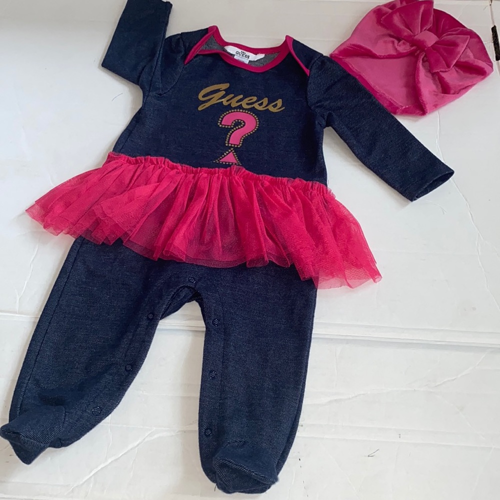 Guess baby girls one piece with matching hat. Size 6-9 months.